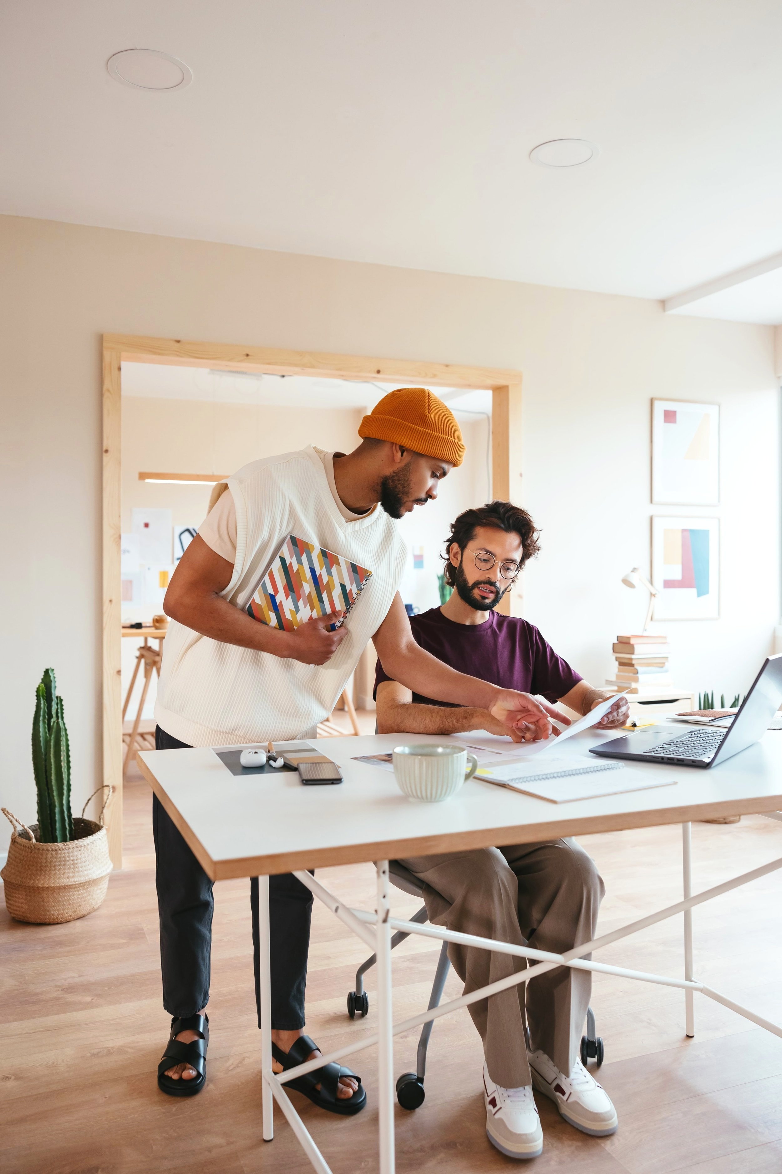 Multiracial men in a creative workspace